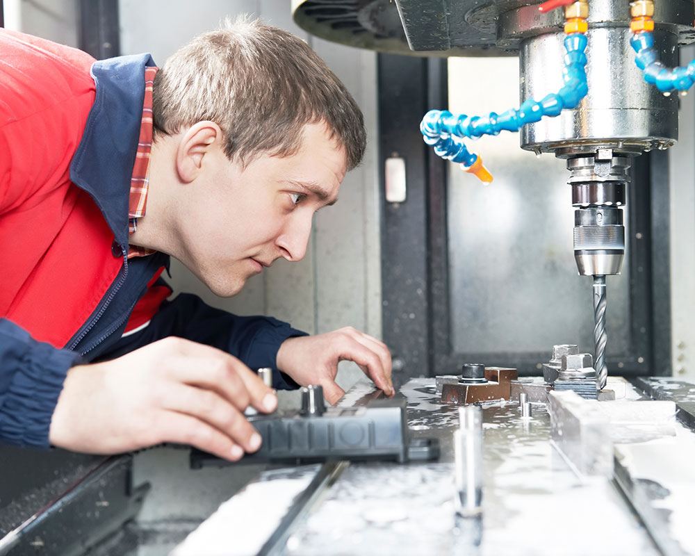 Kent-CNC-Versatile-VMC cnc vertical machining center operator